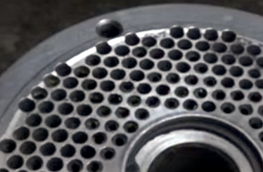 rolled edges of holes in a flat die