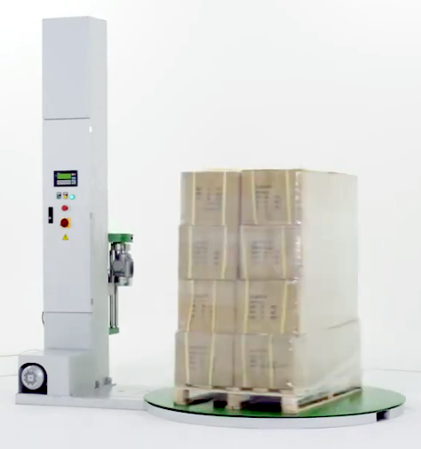 photo of a pallet wrapping machine with bags on a pallet